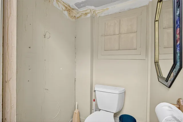 a spacious bedroom with a large bed and a window