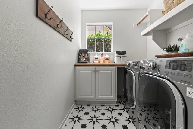 a bathroom with a sink and a window