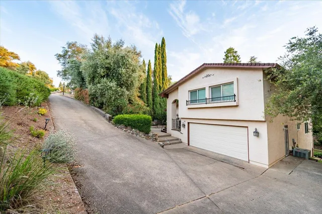 a view of hallway with wooden floor