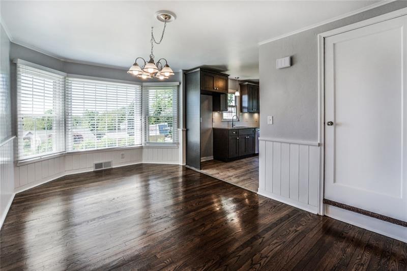 159 Gass Road Pittsburgh, PA 15229 - Photo 4 of 24 Nice flow between the dining room and living room.