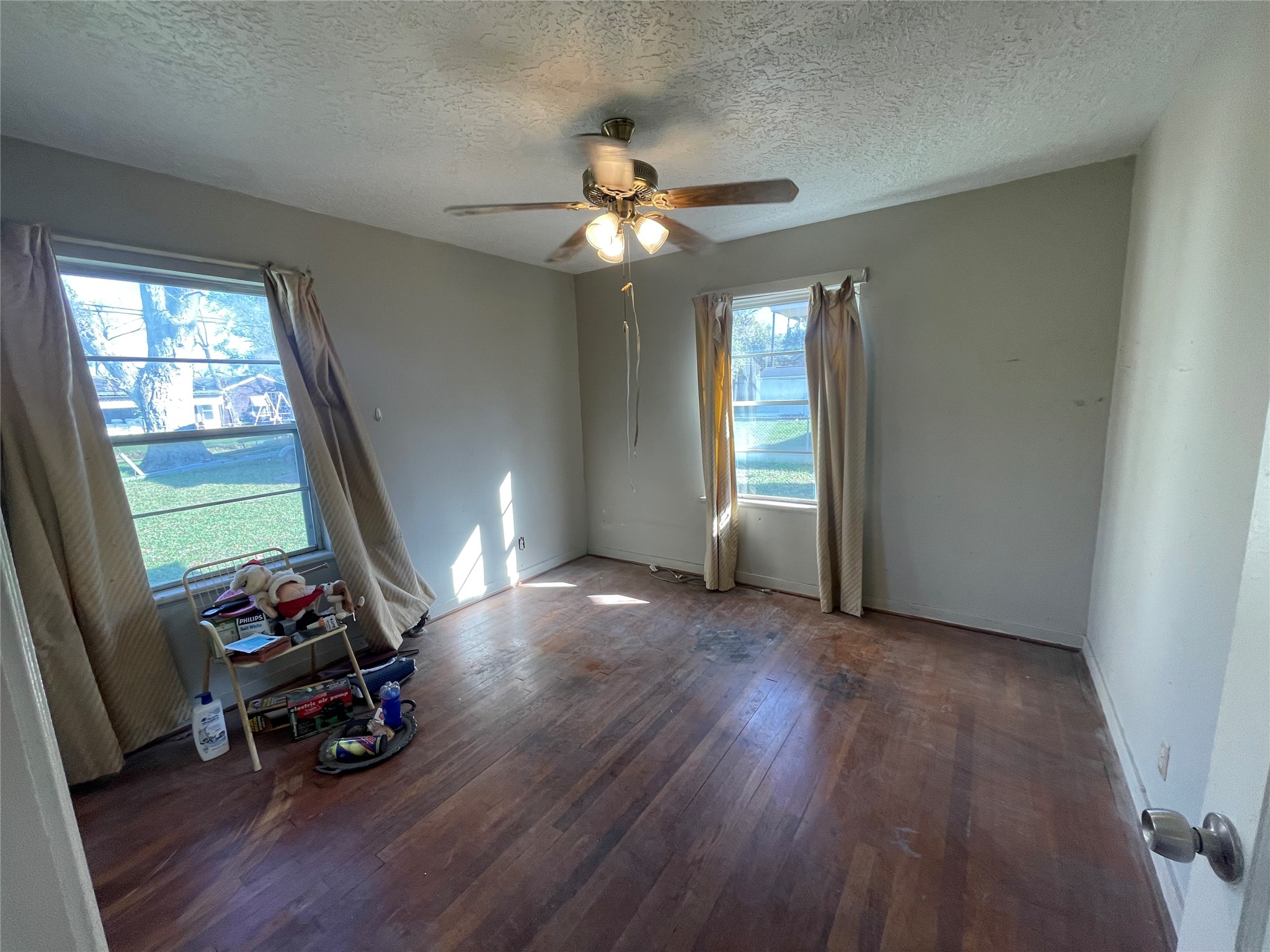 6642 Teluco Street Houston, TX 77055 - Photo 12 of 27 a view of a room with wooden floor gym equipment