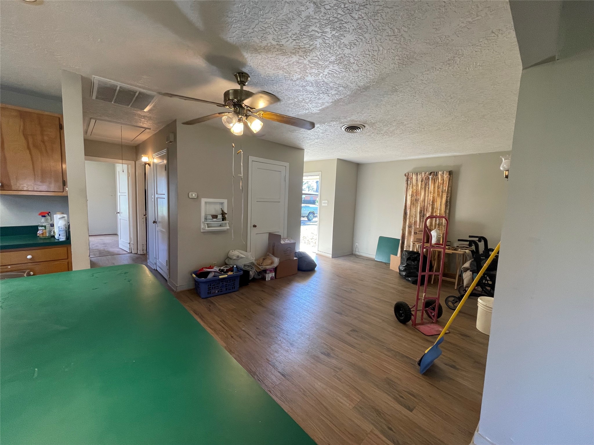 6642 Teluco Street Houston, TX 77055 - Photo 2 of 27 a view of a livingroom and dining room and hardwood floor
