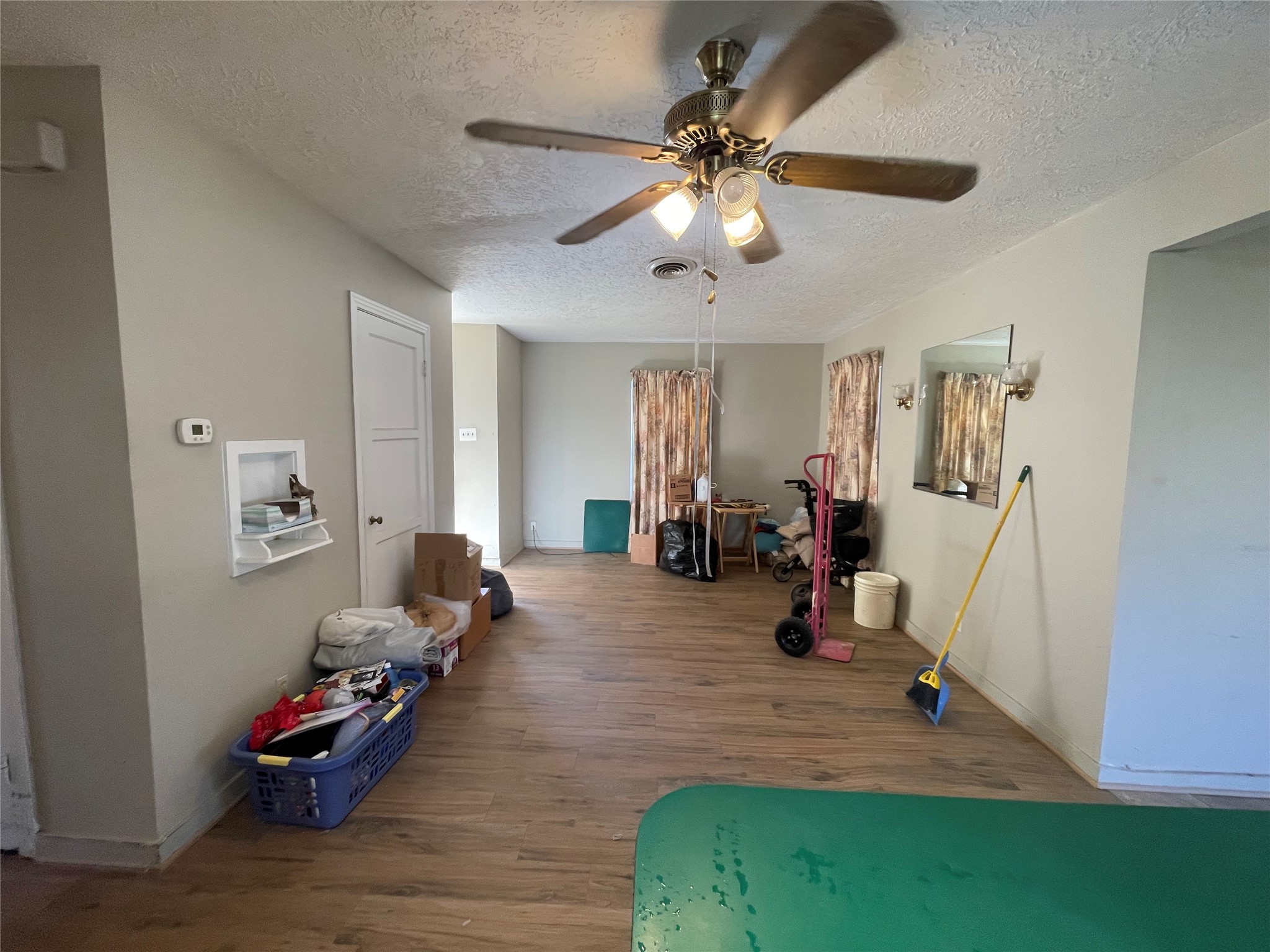 6642 Teluco Street Houston, TX 77055 - Photo 3 of 27 a living room with furniture and wooden floor