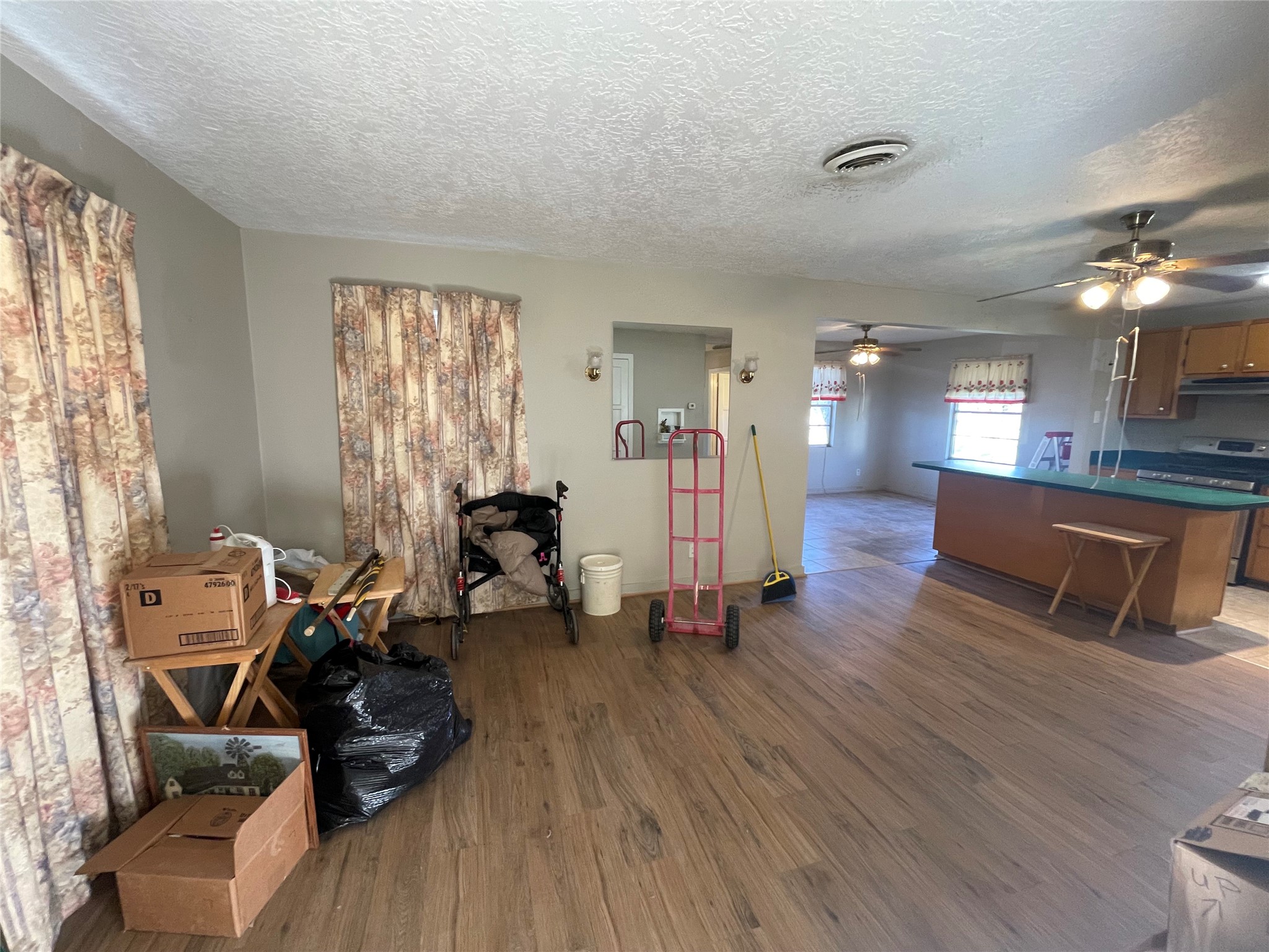6642 Teluco Street Houston, TX 77055 - Photo 4 of 27 a living room with furniture and a wooden floor