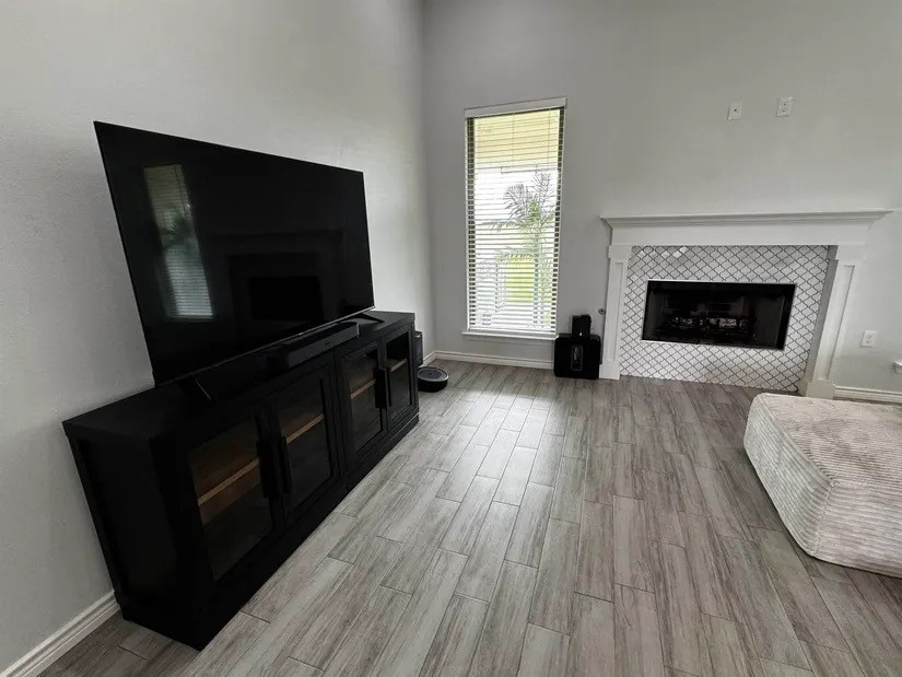 2295 Diamond D Lane Beaumont, TX 77713 - Photo 6 of 40 a living room with furniture and a flat screen tv