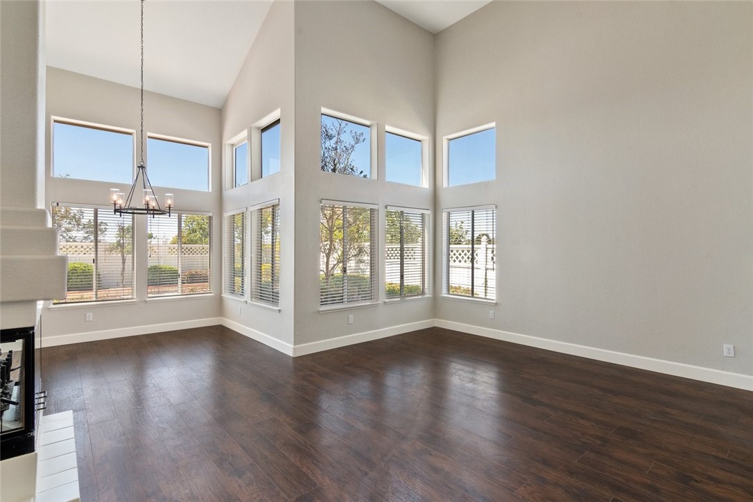 31895 Dane Court Temecula, CA 92591 - Photo 13 of 48 a view of an empty room with wooden floor and a window