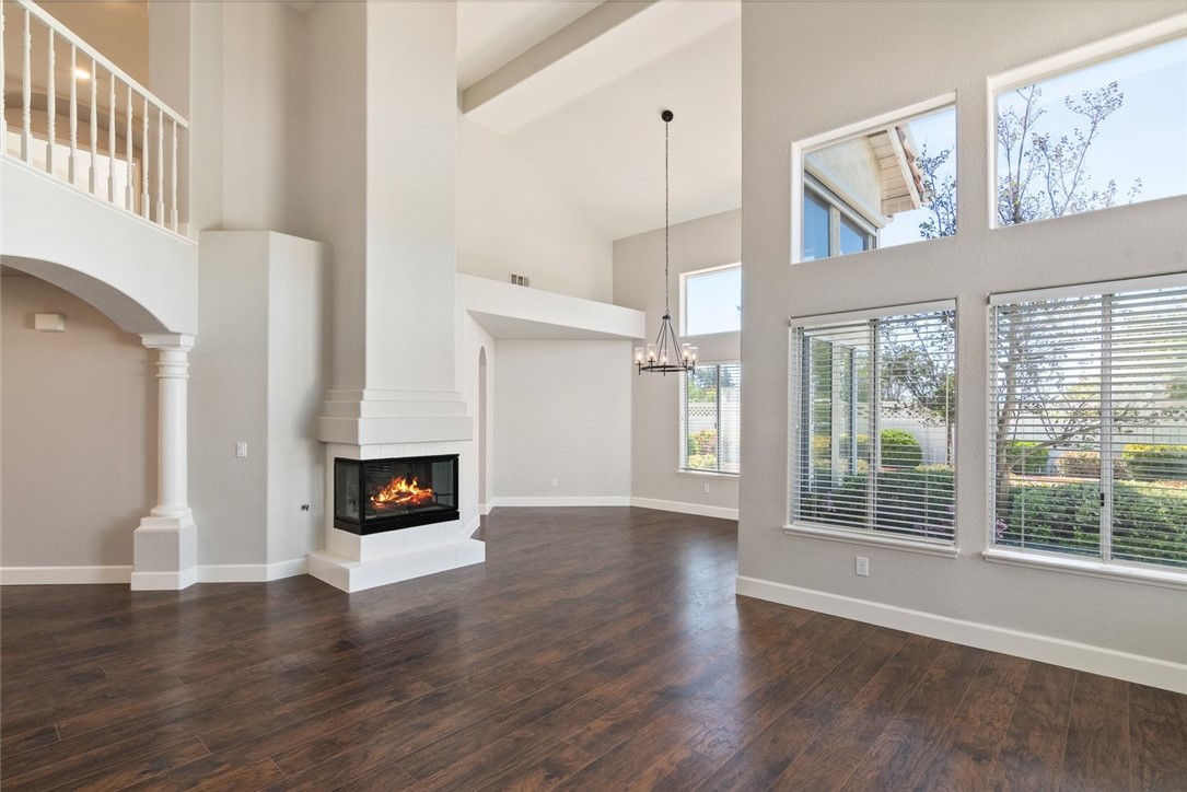 31895 Dane Court Temecula, CA 92591 - Photo 14 of 48 a view of a livingroom with wooden floor and a fireplace