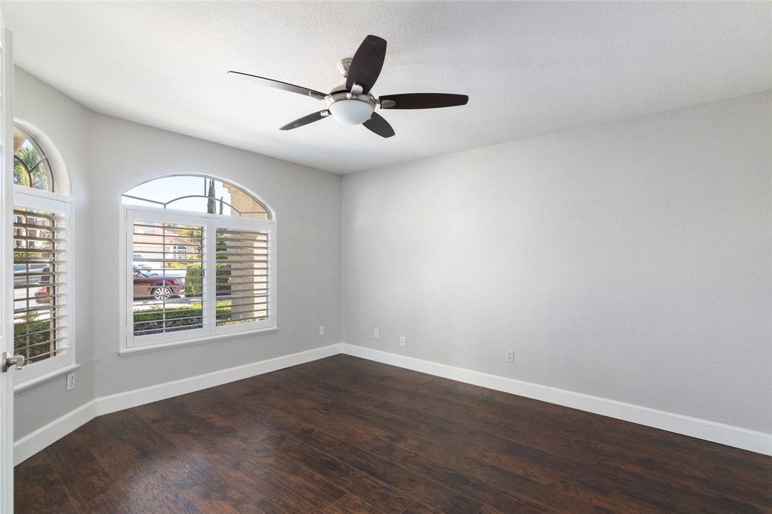 31895 Dane Court Temecula, CA 92591 - Photo 17 of 48 a view of an empty room with wooden floor and a window