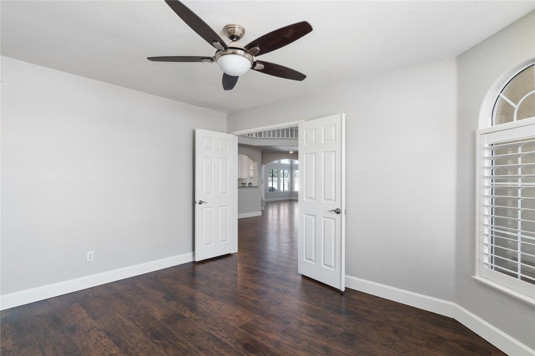 31895 Dane Court Temecula, CA 92591 - Photo 18 of 48 an empty room with wooden floor and windows