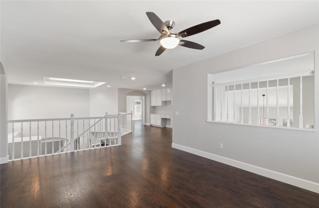 31895 Dane Court Temecula, CA 92591 - Photo 23 of 48 an empty room with wooden floor fan and windows