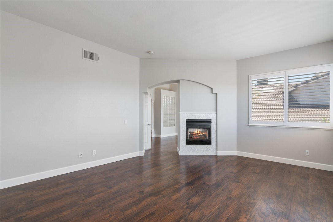 31895 Dane Court Temecula, CA 92591 - Photo 32 of 48 a view of an empty room with wooden floor and a window