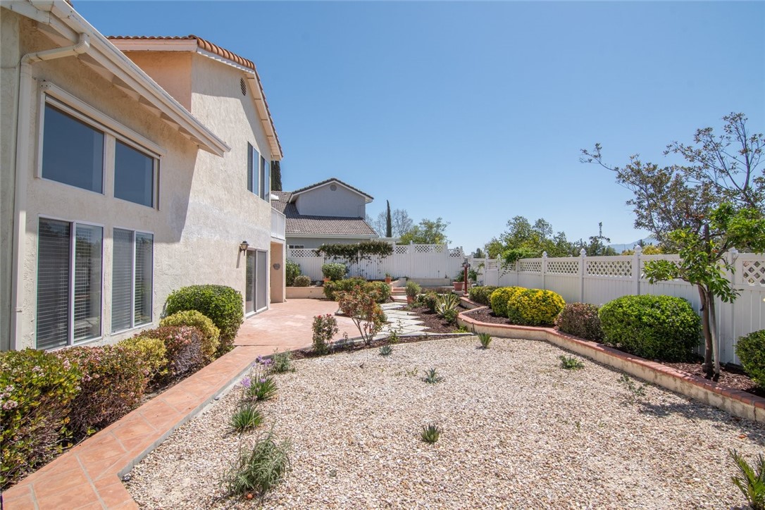 31895 Dane Court Temecula, CA 92591 - Photo 40 of 48 a view of a backyard with sitting area and furniture