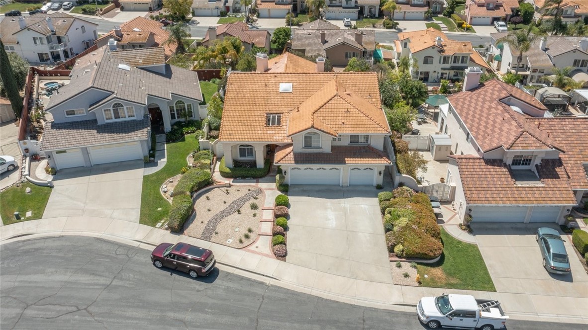31895 Dane Court Temecula, CA 92591 - Photo 43 of 48 an aerial view of a house with a lot of cars parked on the road