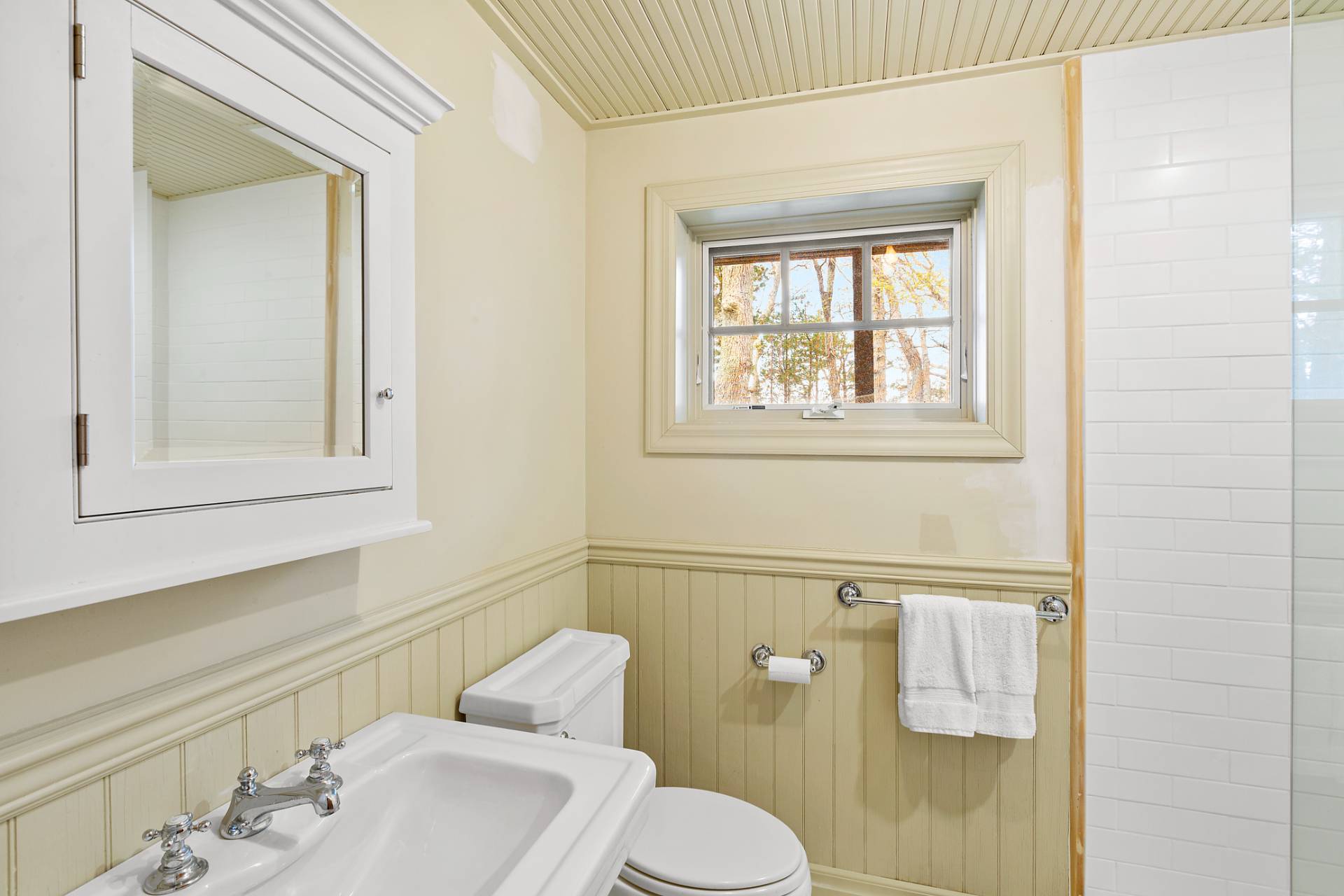 26 Duke Drive East Hampton, NY 11937 - Photo 13 of 20 a bathroom with a sink toilet and mirror