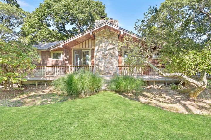 26 Duke Drive East Hampton, NY 11937 - Photo 18 of 20 a view of a house with a yard