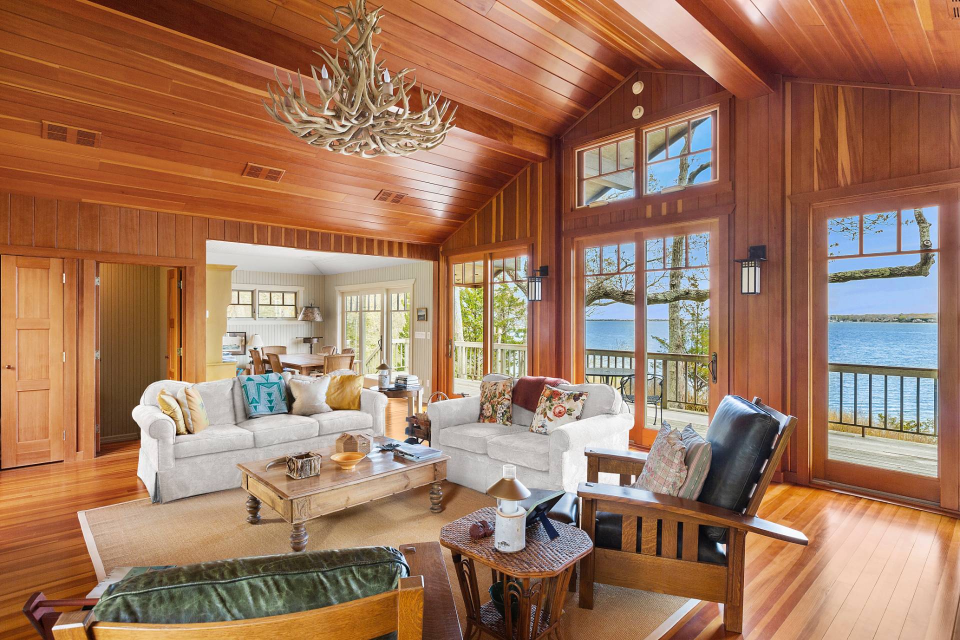 26 Duke Drive East Hampton, NY 11937 - Photo 8 of 20 a living room with furniture a chandelier and a dining table