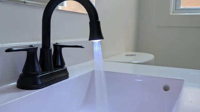 wooden floor with a close up of a sink