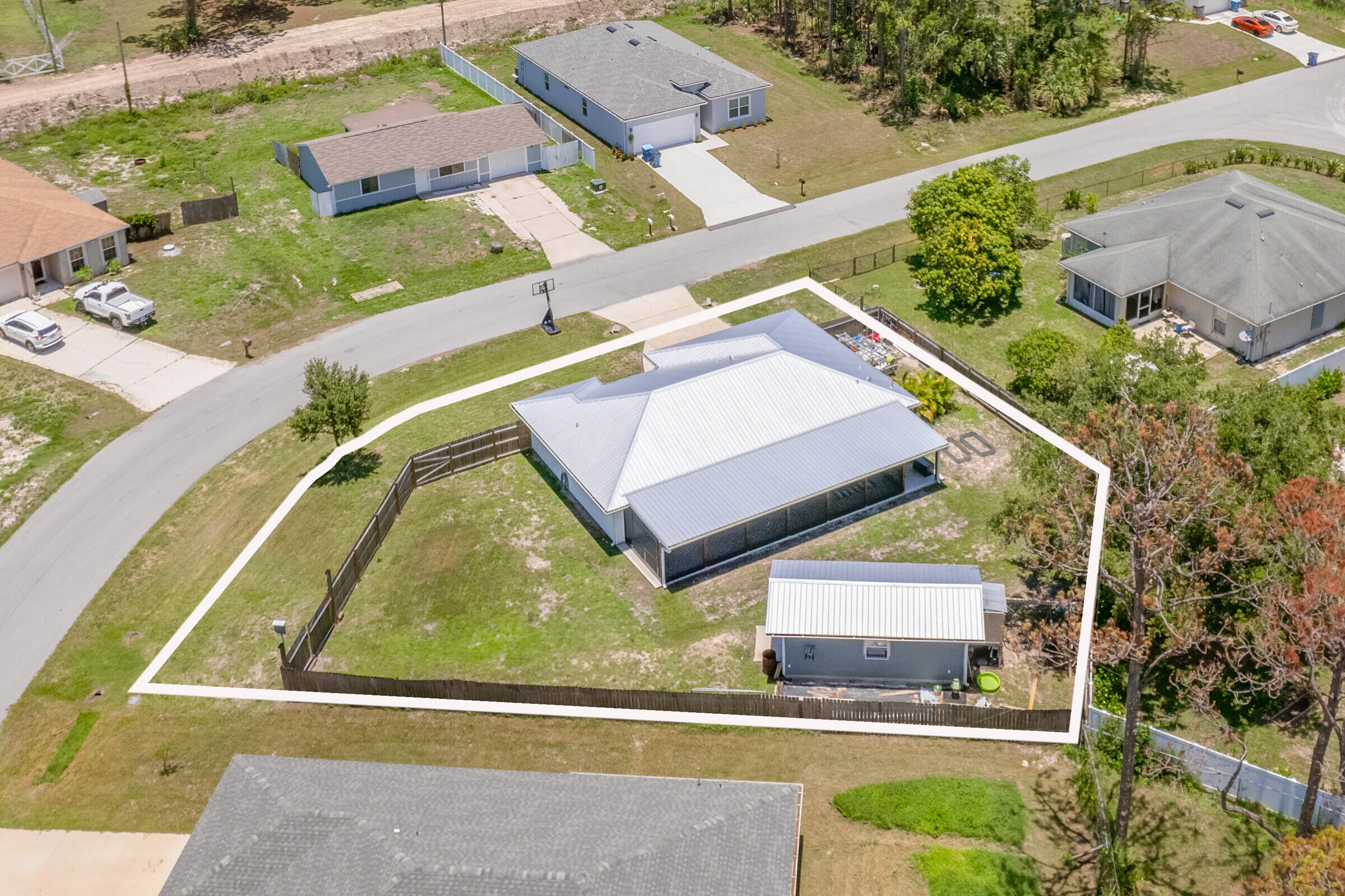 1030 San Rafael Road Southwest Palm Bay, FL 32908 - Photo 2 of 37 an aerial view of a house