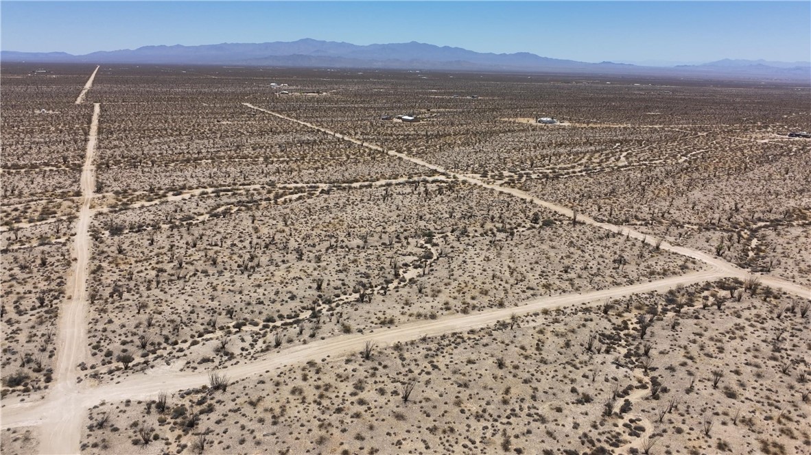 245-24-125 Rainbow Road Yucca, AZ 86438 - Photo 6 of 16 a view of an ocean beach and a mountain
