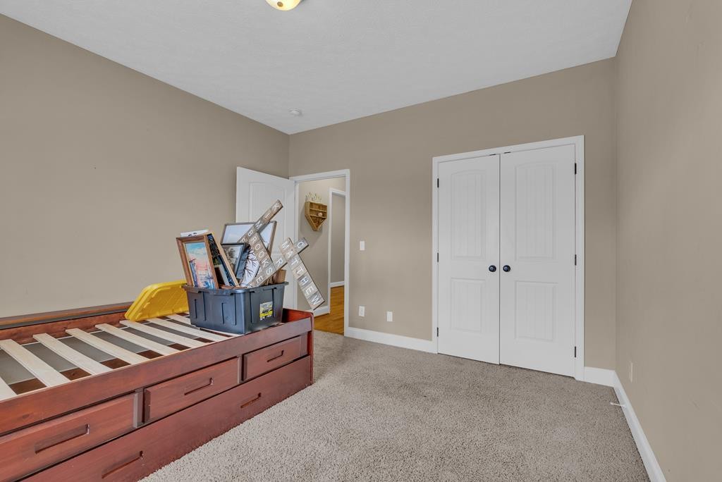 821 Honeysuckle Lane Sparta, TN 38583 - Photo 20 of 25 a room with storage and utility