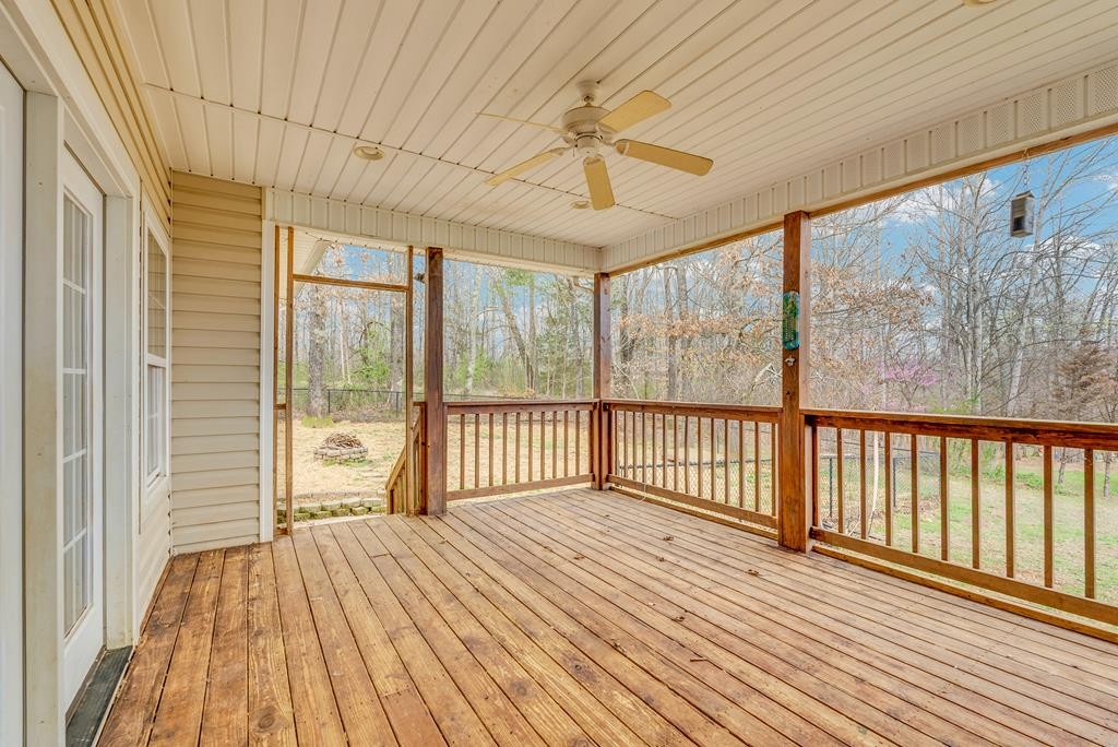 821 Honeysuckle Lane Sparta, TN 38583 - Photo 6 of 25 a view of a room with wooden floor and balcony