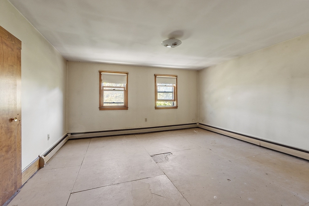 705 Richardson Road Ashby, MA 01431 - Photo 25 of 42 an empty room with windows