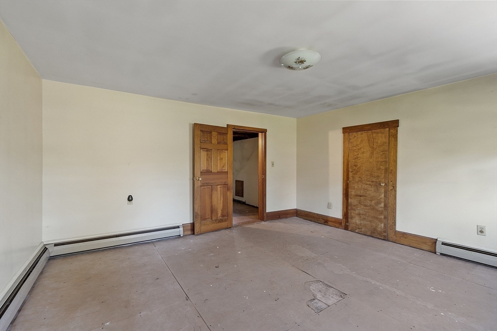 705 Richardson Road Ashby, MA 01431 - Photo 26 of 42 a view of an empty room and closet area