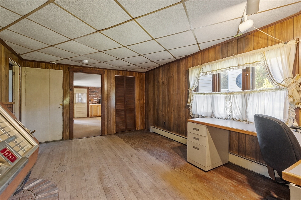 705 Richardson Road Ashby, MA 01431 - Photo 9 of 42 a view of an empty room with a window