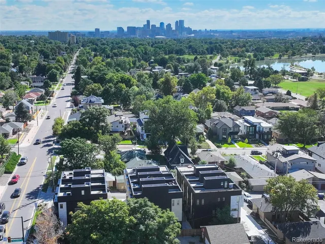an aerial view of a city with lots of residential buildings