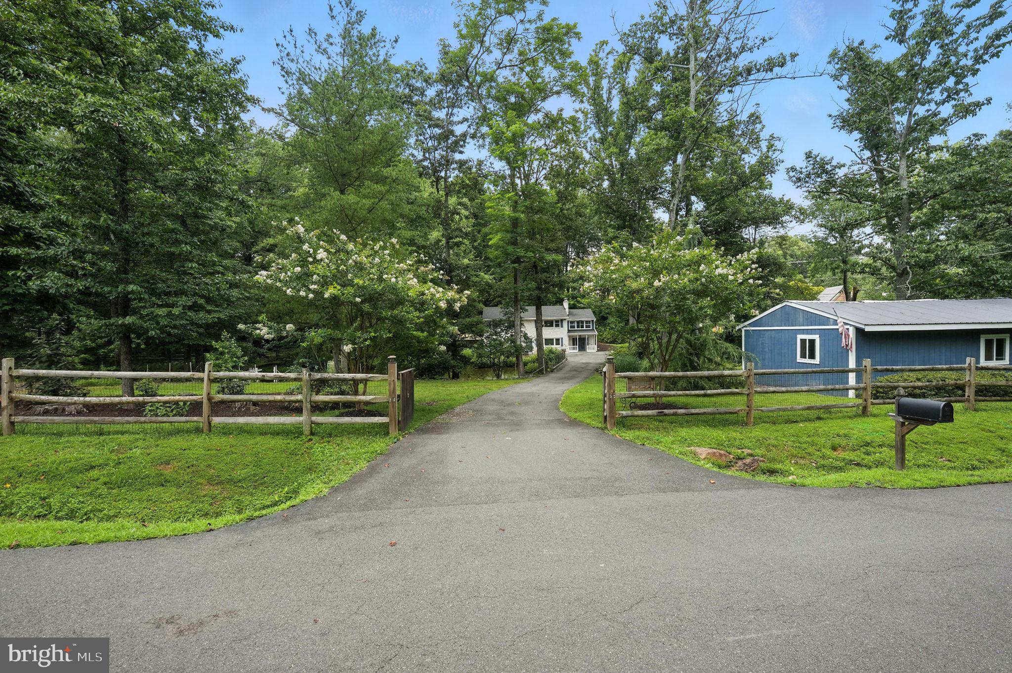 1740 Proffit Road Vienna, VA 22182 - Photo 3 of 51 a view of a house with a big yard