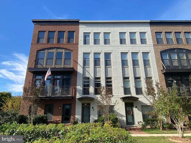 a front view of a building with balcony