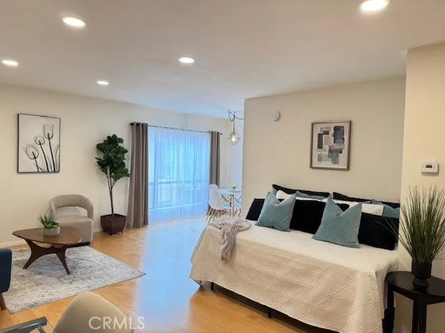 a bedroom with furniture and a couch