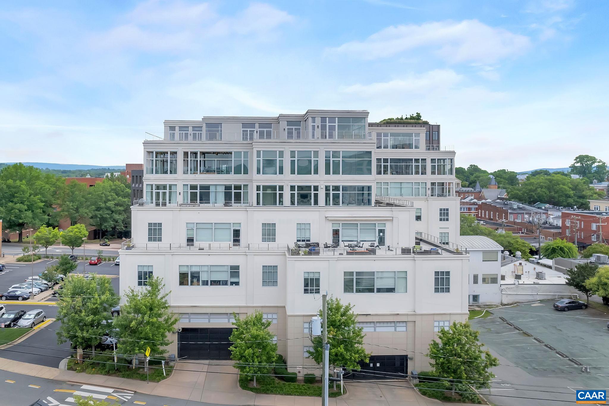 218 West Water Street, Unit 604 Charlottesville, VA 22902 - Photo 41 of 44 a view of a building with a garden and balcony