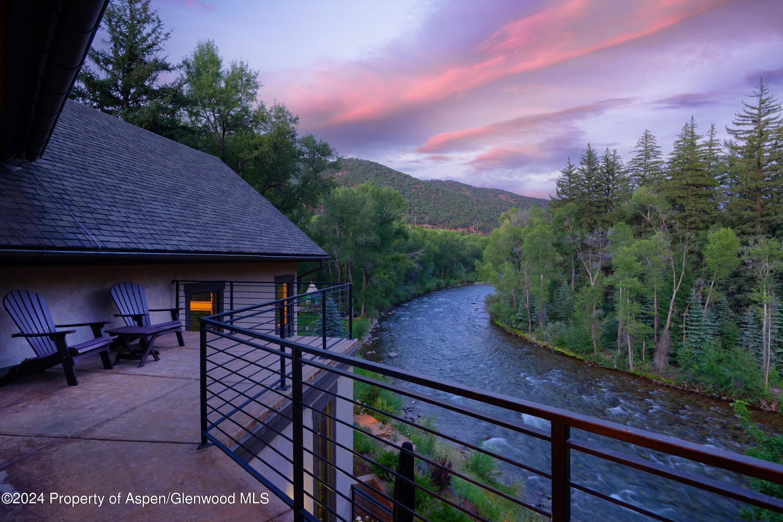 48 River Bend Road Snowmass, CO 81654 - Photo 30 of 32 a view of house with outdoor seating space