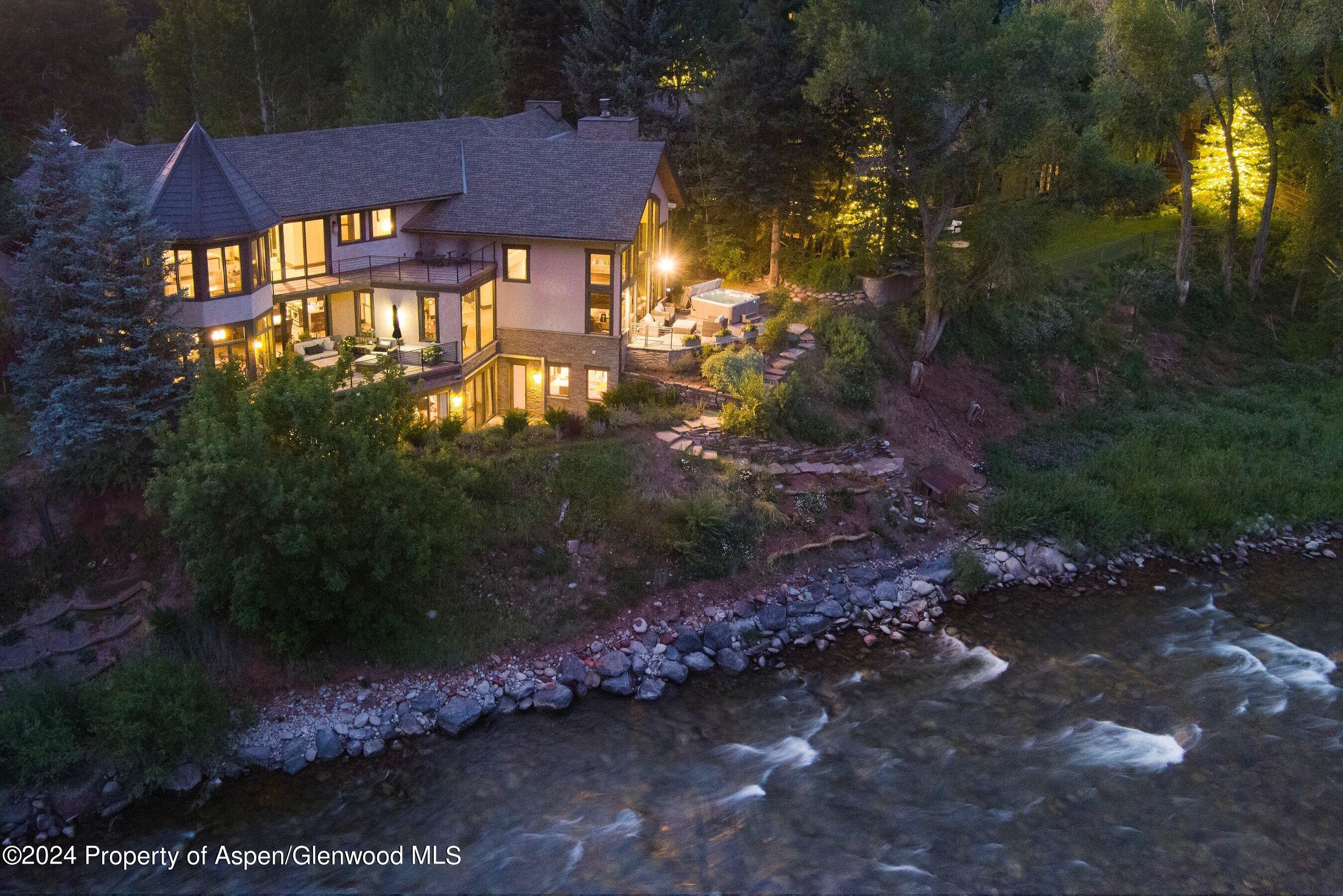 48 River Bend Road Snowmass, CO 81654 - Photo 3 of 32 a view of a yard in front of house