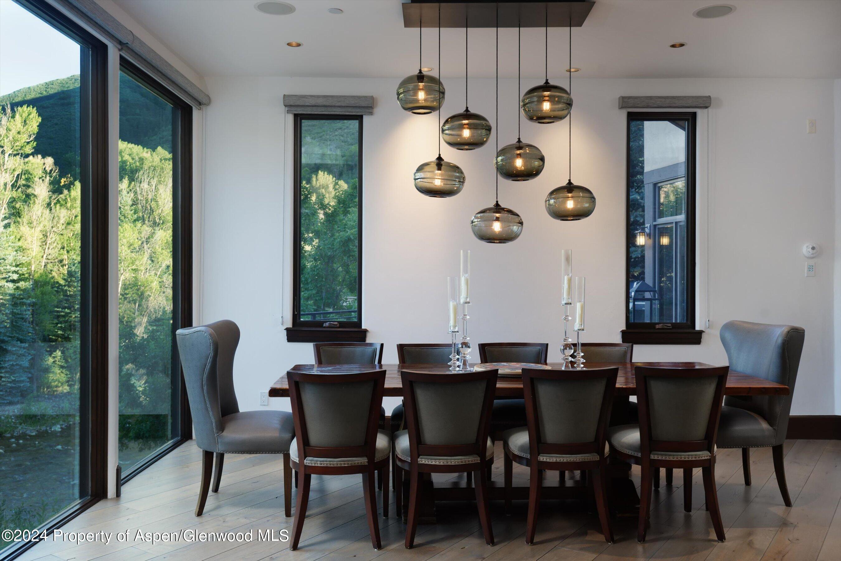 48 River Bend Road Snowmass, CO 81654 - Photo 7 of 32 a dining room with furniture and window