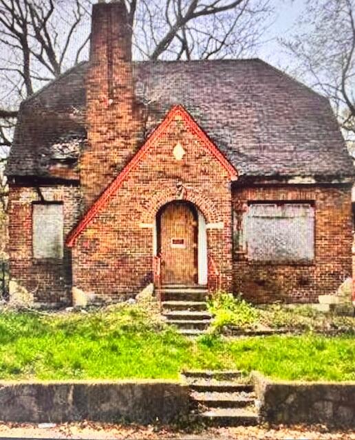 866 Floyd Street Gary, IN 46403 - Photo 1 of 7 a front view of a house with a yard