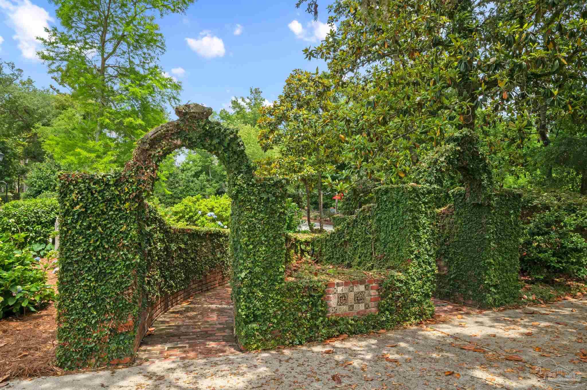 29416 Canal Road Orange Beach, AL 36561 - Photo 50 of 50 a view of a yard with plants and large trees