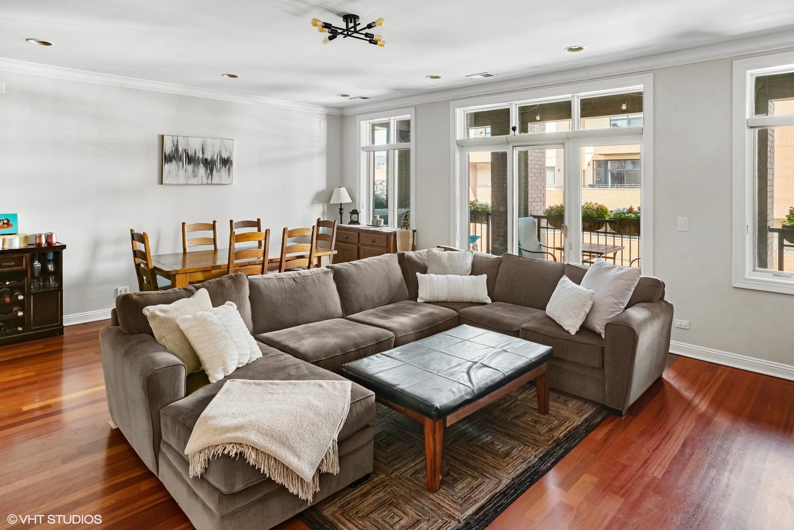 1411 West Chicago Avenue, Unit 3 Chicago, IL 60642 - Photo 2 of 19 a living room with furniture and a large window