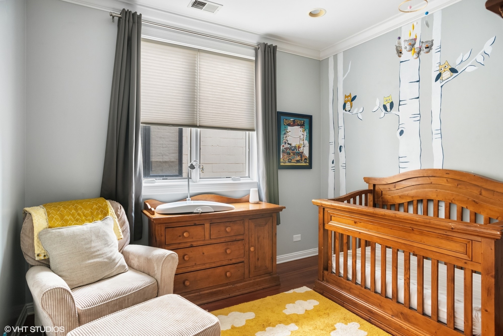 1411 West Chicago Avenue, Unit 3 Chicago, IL 60642 - Photo 14 of 19 a bedroom with a bed and wooden floor