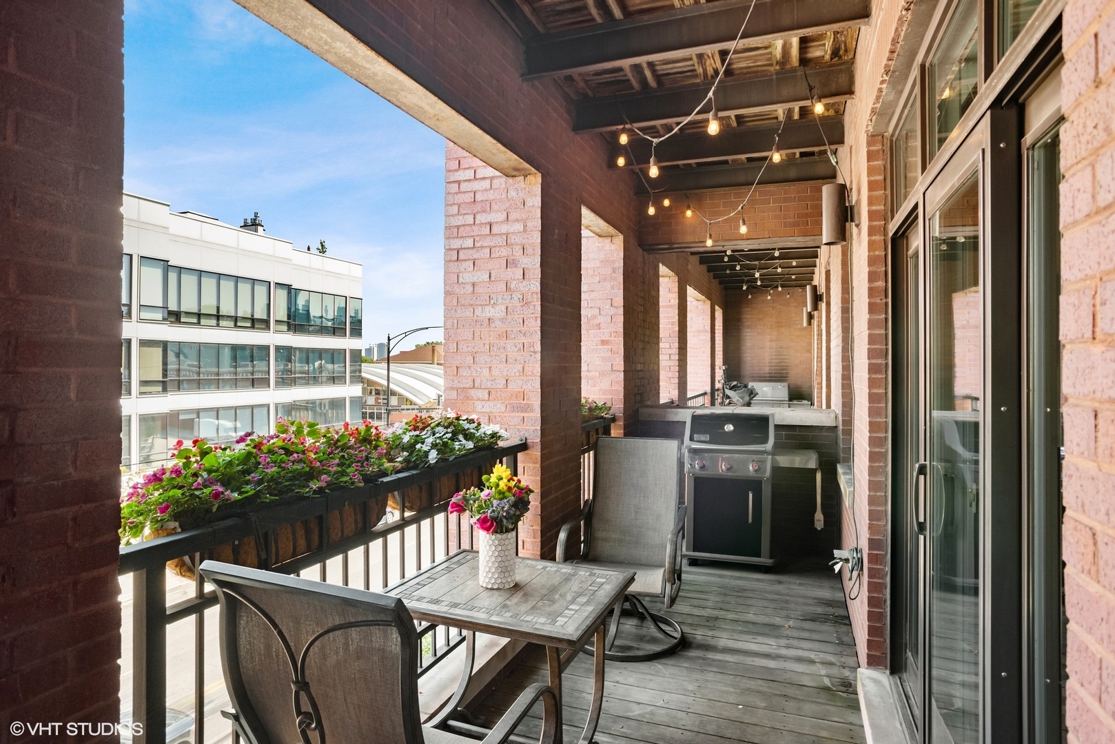 1411 West Chicago Avenue, Unit 3 Chicago, IL 60642 - Photo 19 of 19 a view of a dining room with furniture window and wooden floor