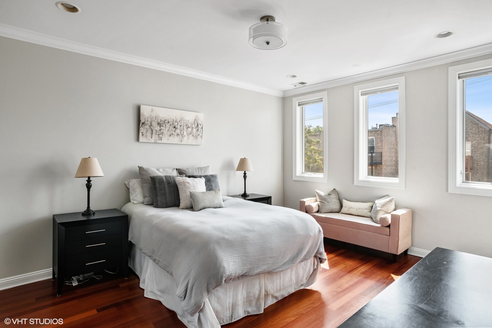 1411 West Chicago Avenue, Unit 3 Chicago, IL 60642 - Photo 10 of 19 a bedroom with bed and a couch