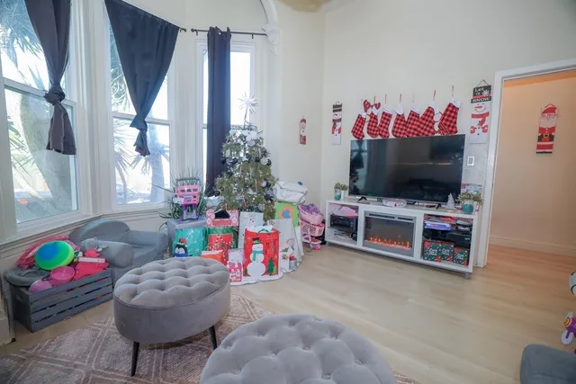 a living room with furniture and a window