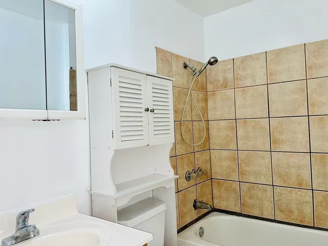 a view of a workspace with furniture