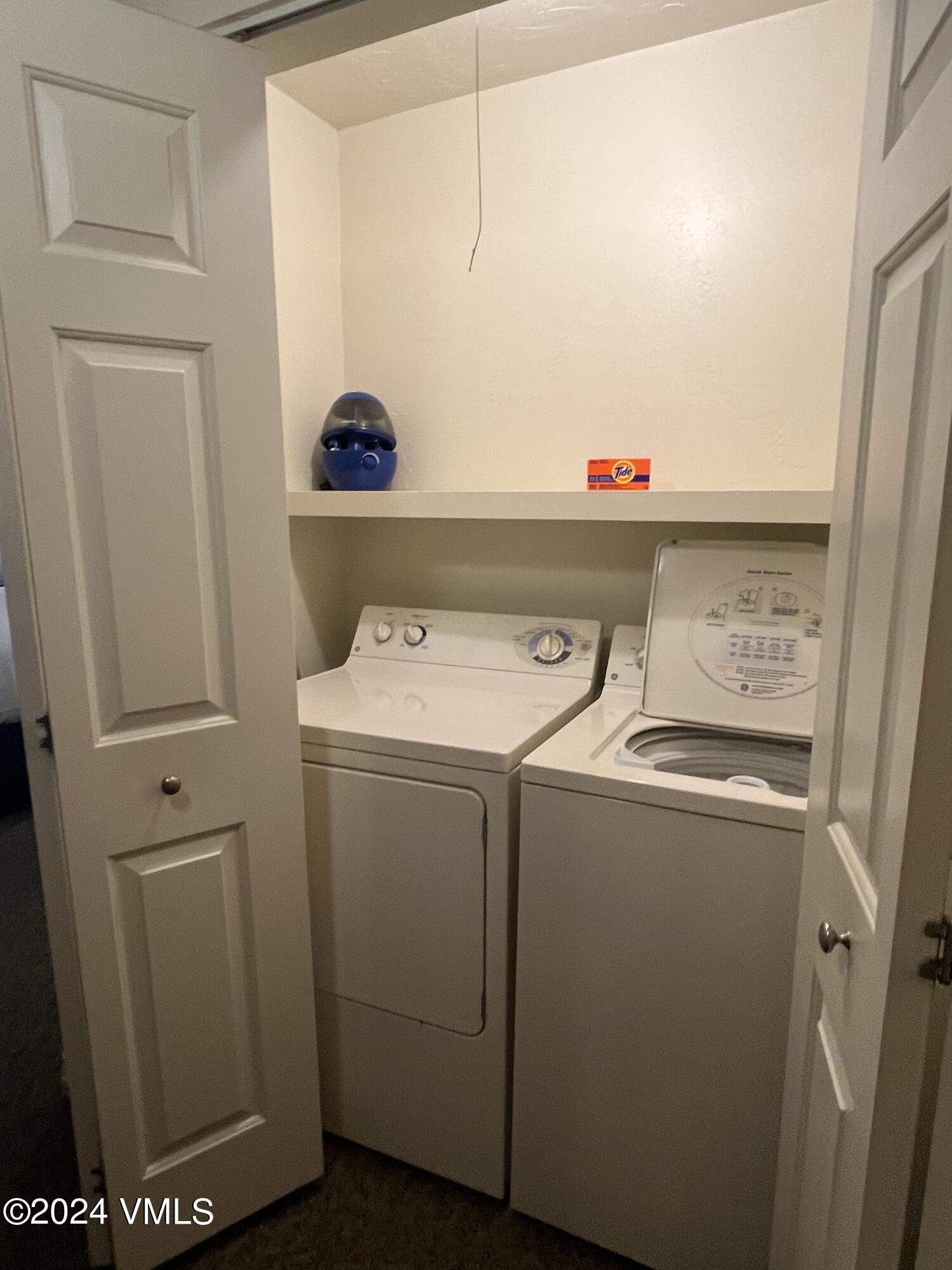 1020 Vail View Drive, Unit 230125 Vail, CO 81657 - Photo 6 of 19 a utility room with dryer and washer