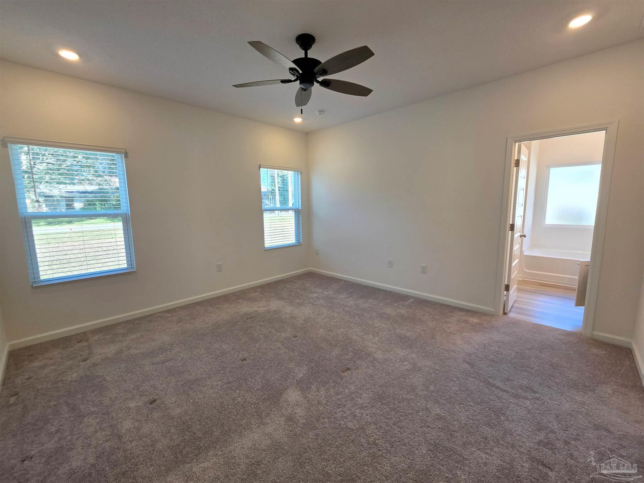 9613 Sagewood Drive Pensacola, FL 32526 - Photo 12 of 27 a view of an empty room with a window