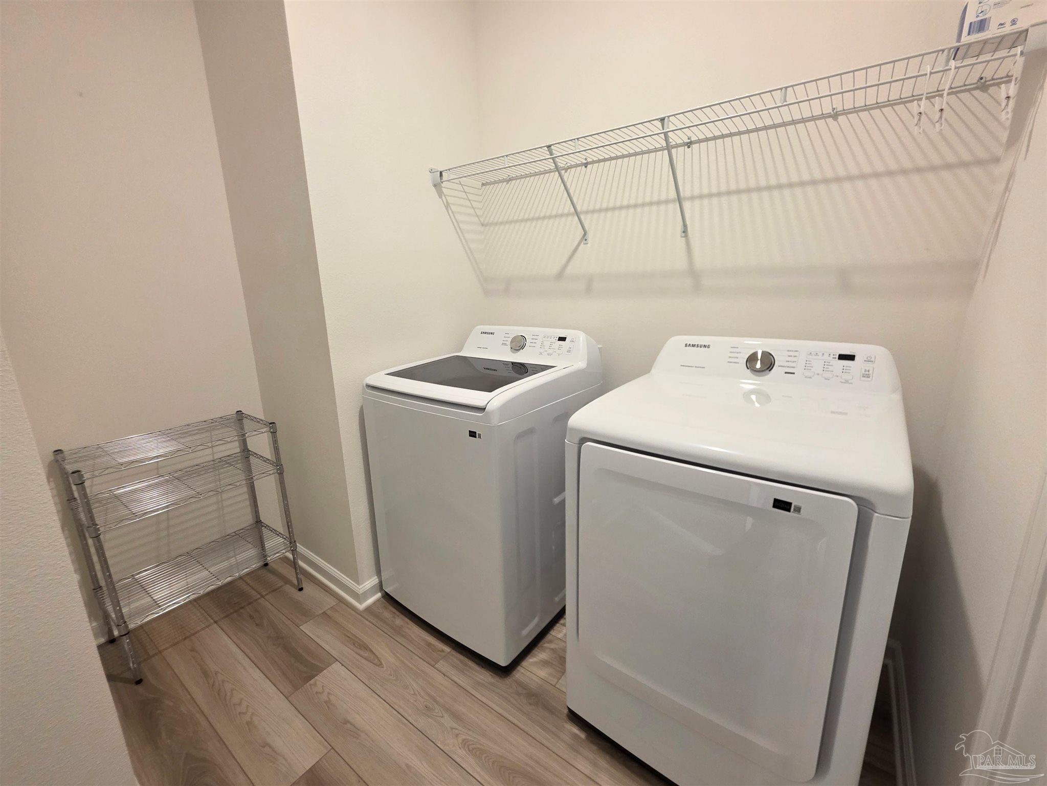 9613 Sagewood Drive Pensacola, FL 32526 - Photo 26 of 27 a utility room with dryer and washer