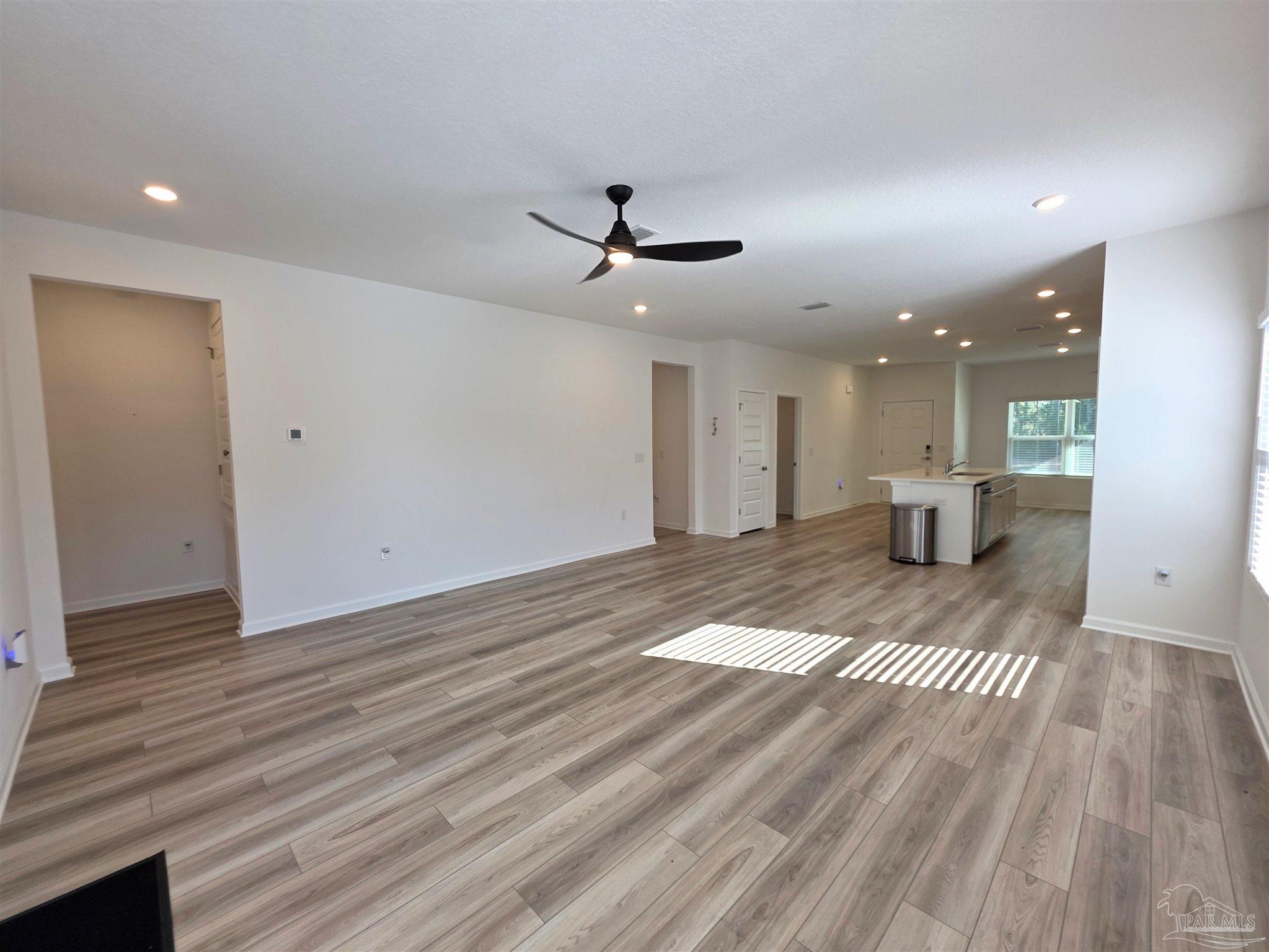 9613 Sagewood Drive Pensacola, FL 32526 - Photo 9 of 27 a view of a livingroom with a hardwood floor