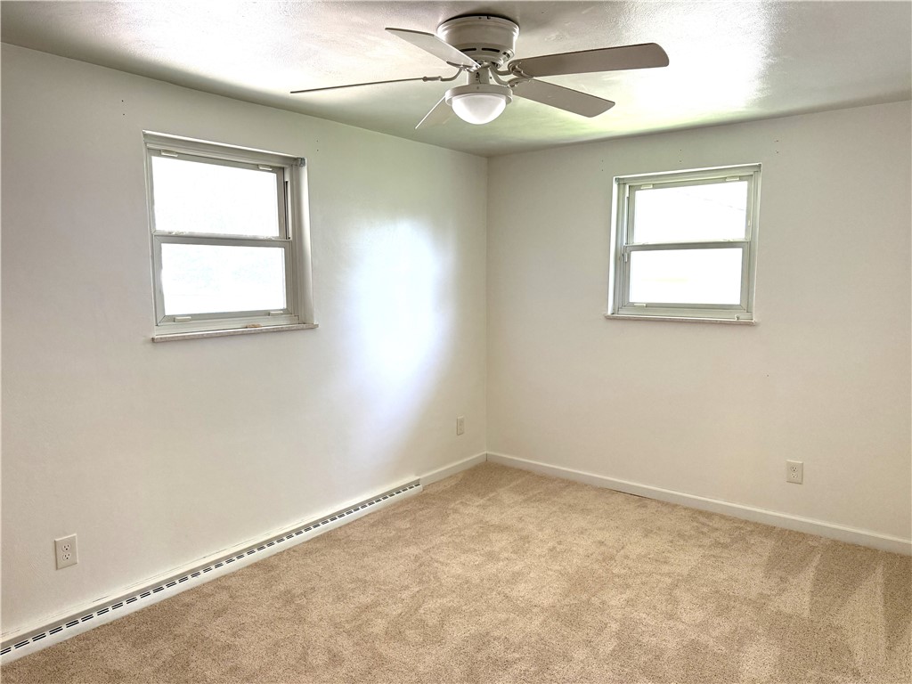 4732 Lehigh Drive Springfield, OH 45503 - Photo 13 of 27 This bright room features abundant natural light and carpet flooring.