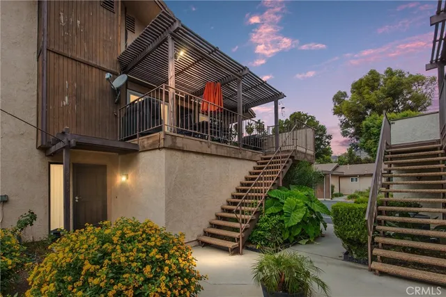 a view of street along with house and green space
